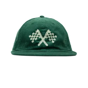 Corduroy cap in green with racing flag chainstitched embroidery